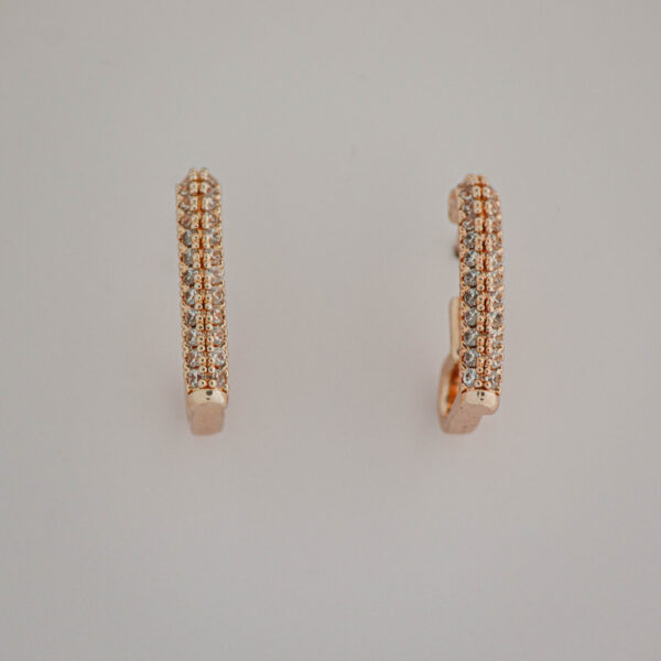 Slant heart studs in rose gold